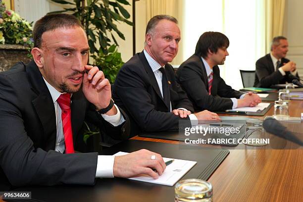 Bayern Munich's Franck Ribery sits beside Bayern chairman Karl-Heinz Rummenigge on the opening day of a hearing at the Court of Arbitration for Sport...