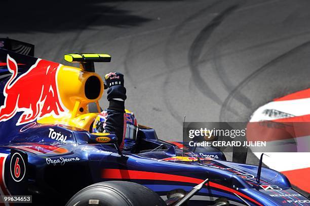 Red Bull's Australian driver Mark Webber celebrates at the Monaco street circuit on May 16 after the Monaco Formula One Grand Prix. Red Bull's...