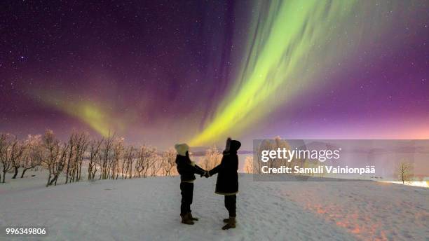 aurora borealis or northern lights, kiruna, sweden - southern lights ストックフォトと画像