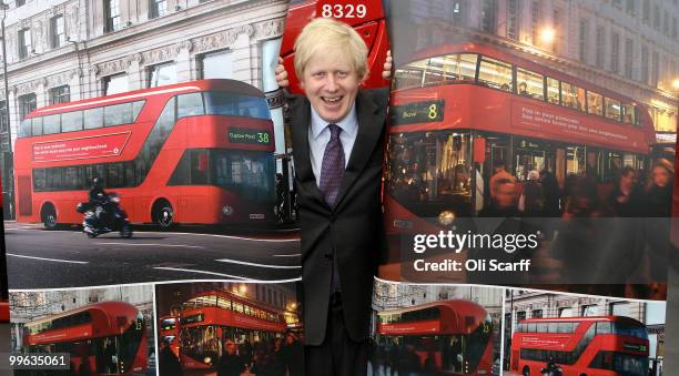 Mayor of London Boris Johnson poses with artists impressions of the design for London's new Routemaster bus on May 17, 2010 in London, England. The...