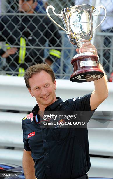 Red Bull's team principal Christian Horner celebrates at the Monaco street circuit on May 16 after the Monaco Formula One Grand Prix. Red Bull's...