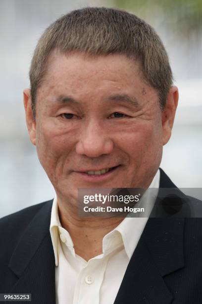 Director Takeshi Kitano attends the "Outrage" Photocall at the Salon Diane at The Majestic during the 63rd Annual Cannes Film Festival on May 17,...