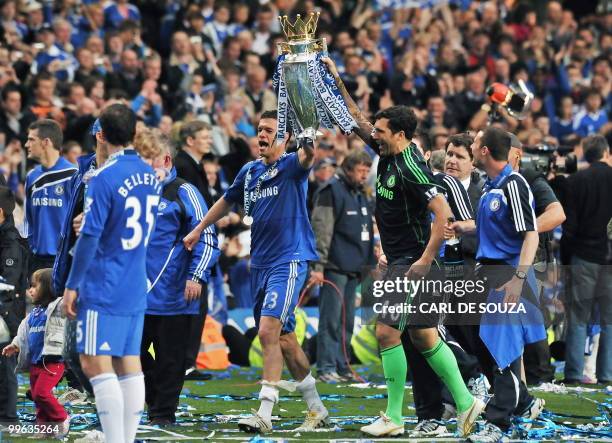 Chelsea's German midfielder Michael Ballack celebrates with team-mate Portuguese goalkeeper Henrique Hilario celebrate with the Barclays Premier...