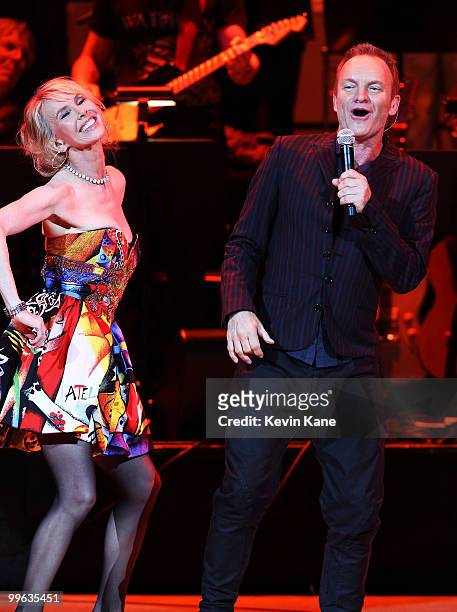 Trudie Styler and Sting perform on stage during the Almay concert to celebrate the Rainforest Fund's 21st birthday at Carnegie Hall on May 13, 2010...