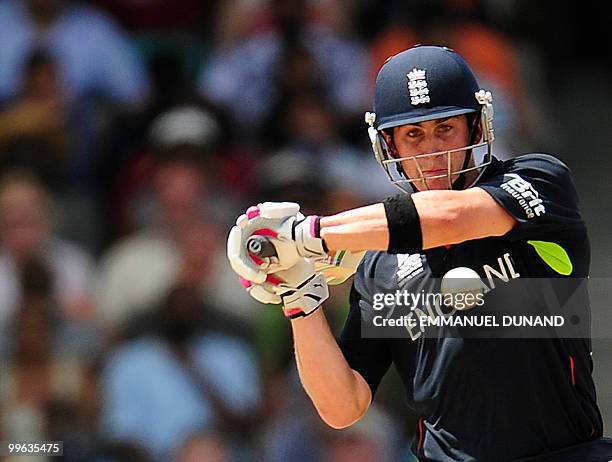 English batsman Craig Kieswetter plays a shot during the Men's ICC World Twenty20 final match between Australia and England at the Kensington Oval...