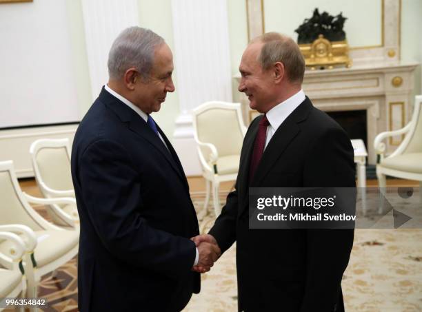 Russian President Vladimir Putin greets Israeli Prime Minister Benjamin Netanyahu during their talks at the Kremlin, in Moscow, Russia, July 2018....