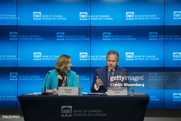 Stephen Poloz, governor of the Bank of Canada, right, speaks while Carolyn Wilkins, senior deputy governor at the Bank of Canada, listens during a...