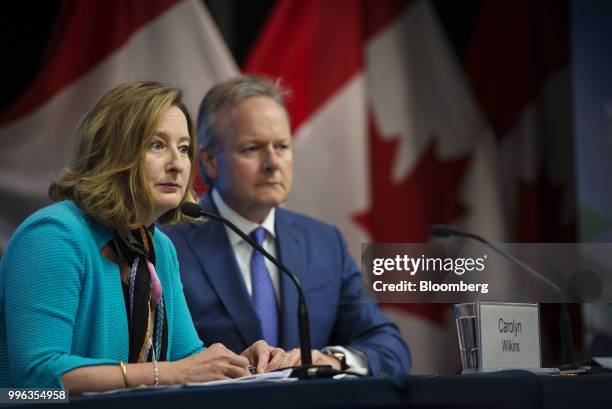 Carolyn Wilkins, senior deputy governor at the Bank of Canada, left, and Stephen Poloz, governor of the Bank of Canada, listen during a press...