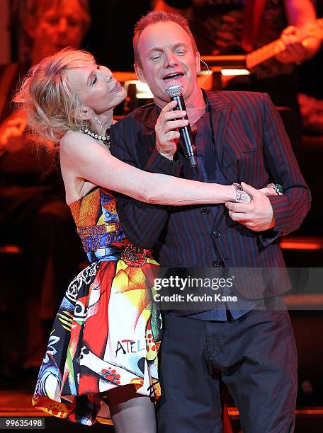 Trudie Styler and Sting perform on stage during the Almay concert to celebrate the Rainforest Fund's 21st birthday at Carnegie Hall on May 13, 2010...