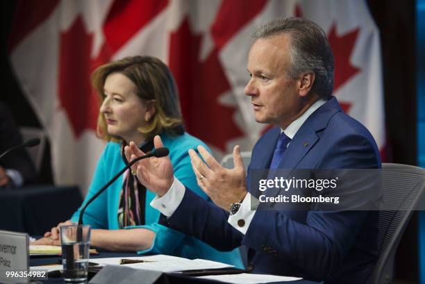 Stephen Poloz, governor of the Bank of Canada, right, speaks while Carolyn Wilkins, senior deputy governor at the Bank of Canada, listens during a...