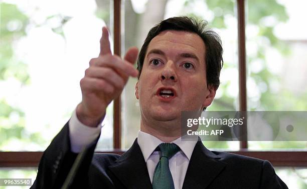 British Chancellor of the Exchequer, George Osborne, gestures during a news conference at the Treasury Office, in central London, May 17, 2010....