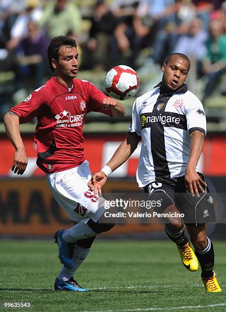 Jonathan Ludovic Biabiany of Parma FC is challenged by Luigi Vitale of AS Livorno Calcio during the Serie A match between Parma FC and AS Livorno...