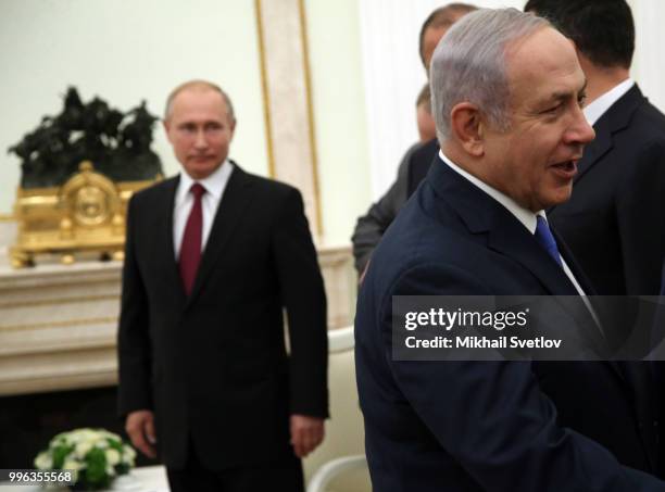 Russian President Vladimir Putin looks on Israeli Prime Minister Benjamin Netanyahu during their talks at the Kremlin, in Moscow, Russia, July 2018....