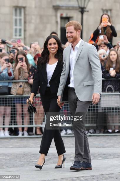 Prince Harry, Duke of Sussex and Meghan, Duchess of Sussex visit Trinity College on the second day of their official two day royal visit to Ireland...