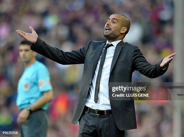 Barcelona's coach Pep Guardiola reacts during the Spanish League football match between Barcelona and Valladolid, on May 16, 2010 at Camp Nou stadium...