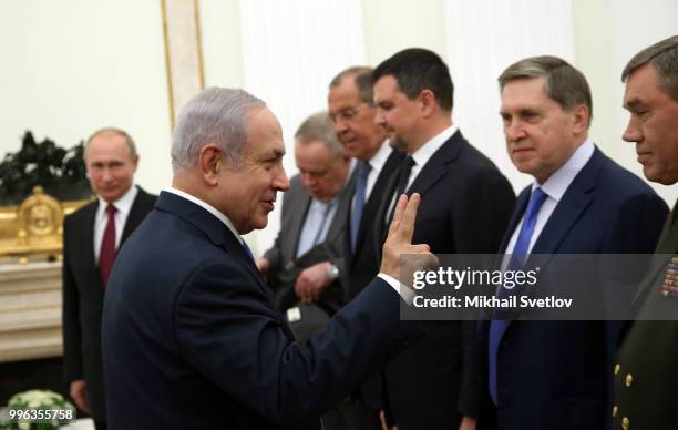 Russian President Vladimir Putin looks on Israeli Prime Minister Benjamin Netanyahu during their talks at the Kremlin, in Moscow, Russia, July 2018....