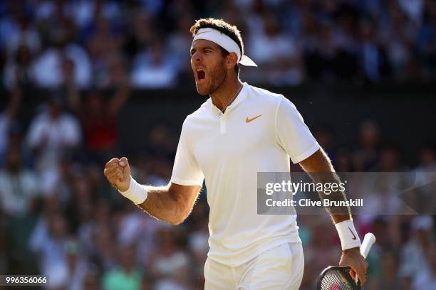 Juan Martin Del Potro of Argentina celebrates winning the second set against Rafael Nadal of Spain during their Men's Singles Quarter-Finals match on...