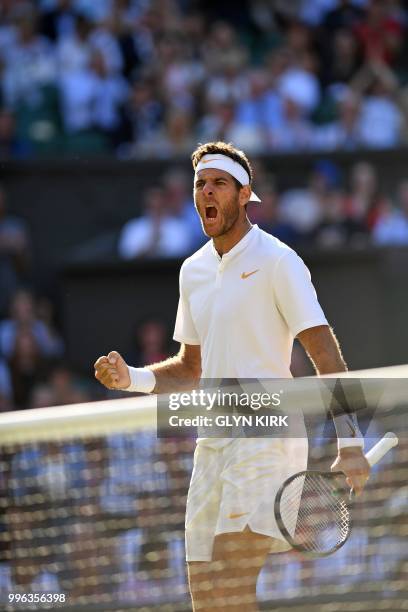 Argentina's Juan Martin del Potro celebrates winning the second set against Spain's Rafael Nadal during their men's singles quarter-finals match on...