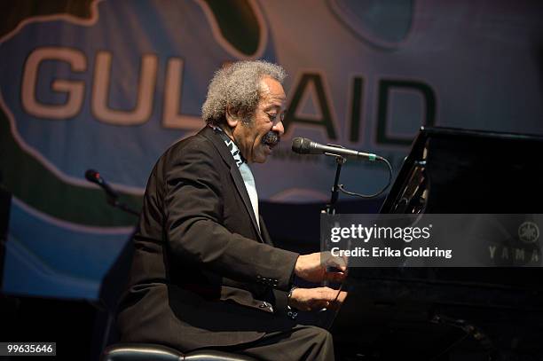 Allen Toussaint performs at the GULF AID benefit concert at Mardi Gras World River City on May 16, 2010 in New Orleans, Louisiana.