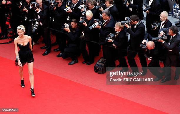 Czech model Eva Herzigova arrives for the screening of "La Princesse de Montpensier" presented in competition at the 63rd Cannes Film Festival on May...