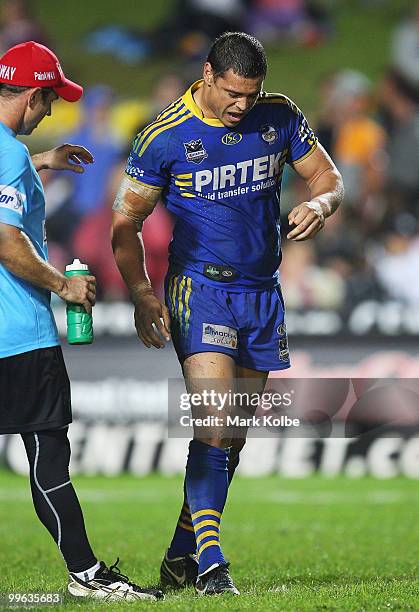 Timana Tahu of the Eels grimaces after injuring his leg during the round ten NRL match between the Manly Sea Eagles and the Parramatta Eels at...