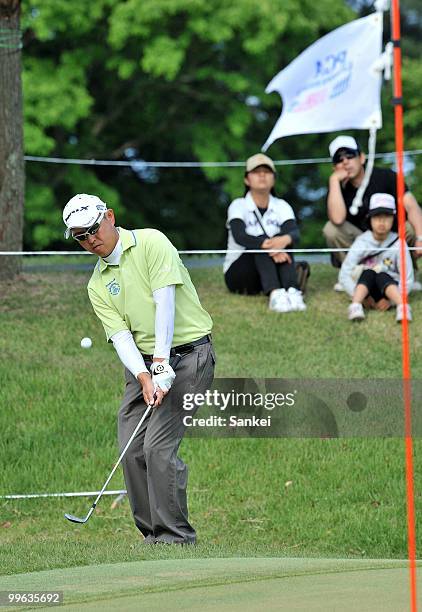 Toru Taniguchi hits an approach shot on the 15th hole during the third round of Japan's PGA Championship Nissin Cup Noodles Cup at Passage Kinkai...