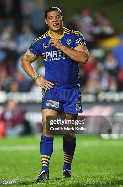 Timana Tahu of the Eels grimaces after injuring his leg during the round ten NRL match between the Manly Sea Eagles and the Parramatta Eels at...