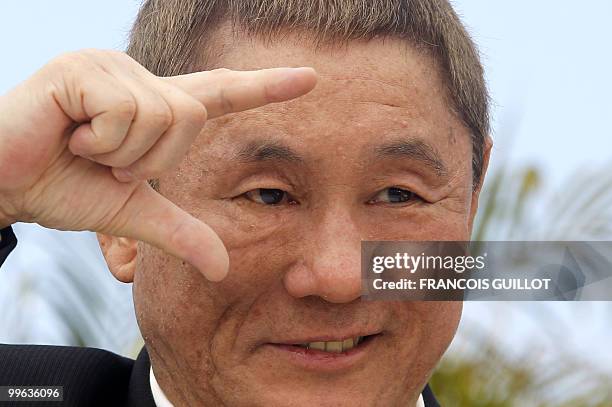 Japanese actor and director Takeshi Kitano poses during the photocall of "Outrage" presented in competition at the 63rd Cannes Film Festival on May...