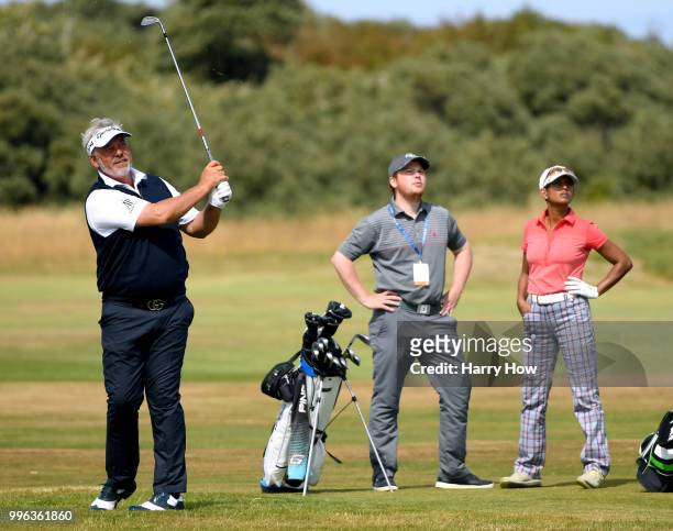 Darren Clarke of Northern Ireland watches his second shot on the ninth hole during the Pro-Am event of the Aberdeen Standard Investments Scottish...