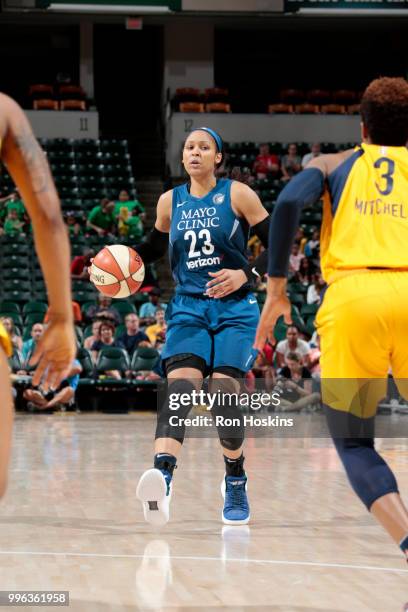 Maya Moore of the Minnesota Lynx handles the ball against the Indiana Fever on July 11, 2018 at Bankers Life Fieldhouse in Indianapolis, Indiana....