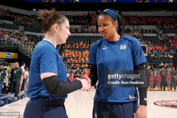 Lindsay Whalen and Maya Moore of the Minnesota Lynx speak before the game against the Indiana Fever on July 11, 2018 at Bankers Life Fieldhouse in...