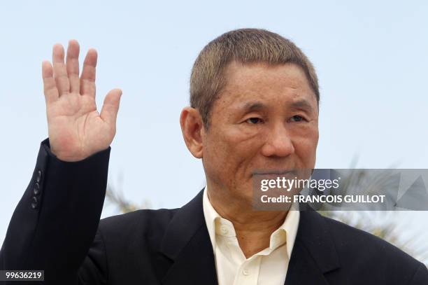 Japanese actor and director Takeshi Kitano poses during the photocall of "Outrage" presented in competition at the 63rd Cannes Film Festival on May...