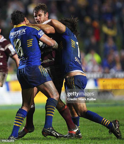 Josh Perry of the Eagles is tackled during the round ten NRL match between the Manly Sea Eagles and the Parramatta Eels at Brookvale Oval on May 17,...