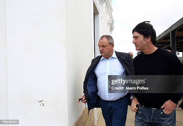 Head coach Joachim Loew of Germany and press officer of the German Football Association DFB Harald Stenger leave a press conference on May 17, 2010...