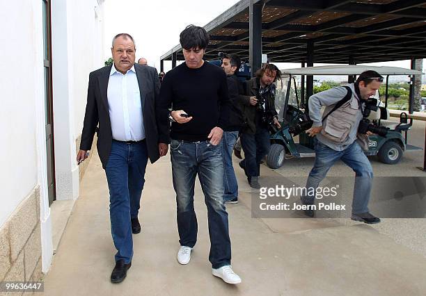 Head coach Joachim Loew of Germany and press officer of the German Football Association DFB Harald Stenger leave a press conference on May 17, 2010...