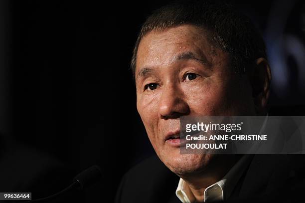 Japanese actor and director Takeshi Kitano speak during the press conference of "Outrage" presented in competition at the 63rd Cannes Film Festival...