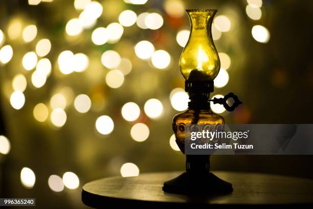 oil lamp - lampe à pétrole photos et images de collection