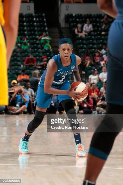 Danielle Robinson of the Minnesota Lynx handles the ball against the Indiana Fever on July 11, 2018 at Bankers Life Fieldhouse in Indianapolis,...