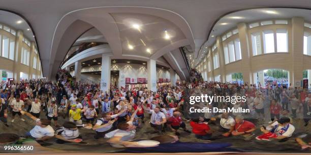 England fans enjoy the pre match atmosphere prior to the 2018 FIFA World Cup Russia Semi Final match between England and Croatia at Luzhniki Stadium...