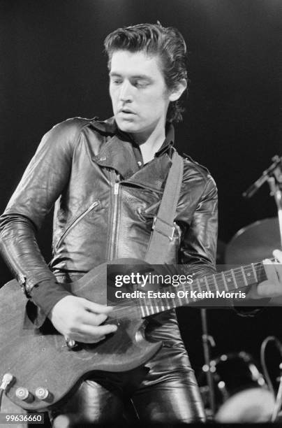English guitarist Chris Spedding in concert with John Cale at the New Victoria Theatre in London, 20th November 1975.