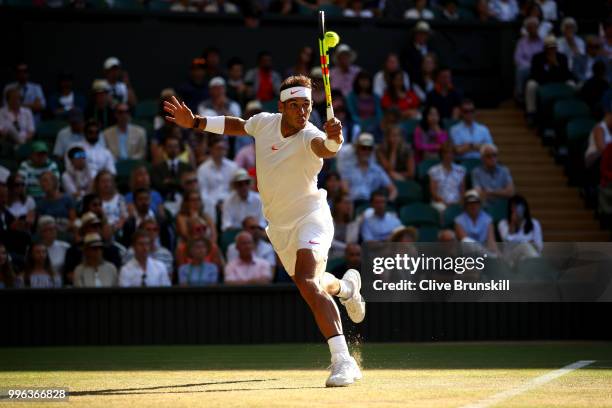 Rafael Nadal of Spain plays a backhand against Juan Martin Del Potro of Argentina during their Men's Singles Quarter-Finals match on day nine of the...