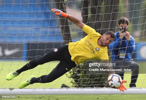 Daniele Padelli of FC Internazionale dives to save a shot during the FC Internazionale training session at the club's training ground Suning Training...