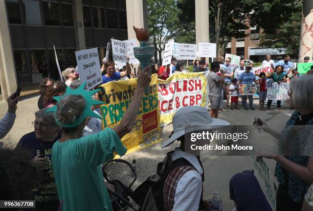 Protesters rally against the separation of immigrant families in front of a U.S. Federal court on July 11, 2018 in Bridgeport, Connecticut. The rally...