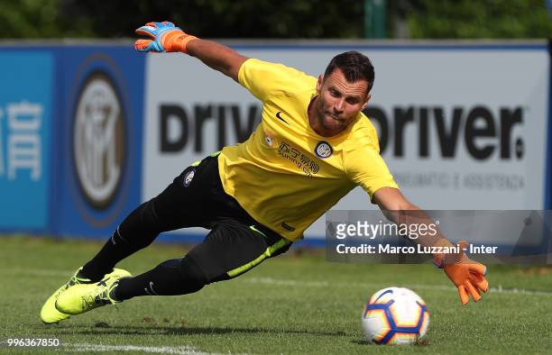 Daniele Padelli of FC Internazionale dives to save a shot during the FC Internazionale training session at the club's training ground Suning Training...