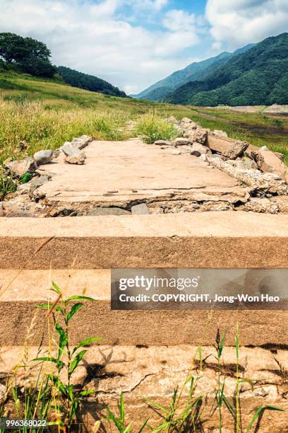 ruined stone steps - jong won heo stock-fotos und bilder