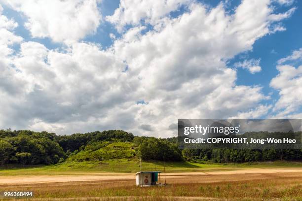 the fishing cabin on the meadow - jong won heo stock pictures, royalty-free photos & images