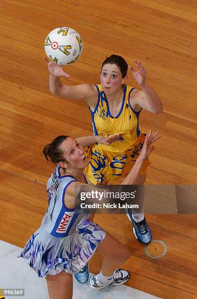 Jane Altschwager of the Swifts and Sarah Sutter of the Thunderbirds in action during the Commonwealth Bank Trophy Netball Grand Final between the...