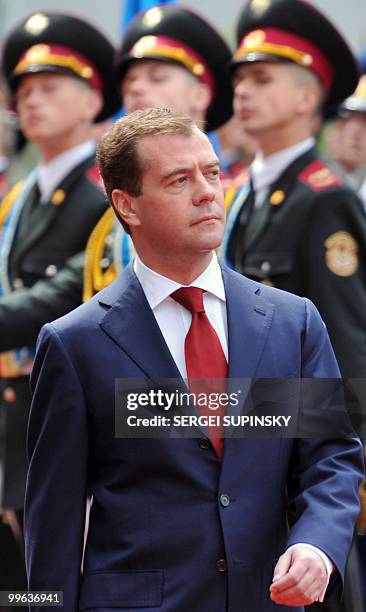 Russian President Dmitry Medvedev reviews the guard of honour during an official ceremony with his Ukrainian counterpart Viktor Yanukovych in Kiev on...