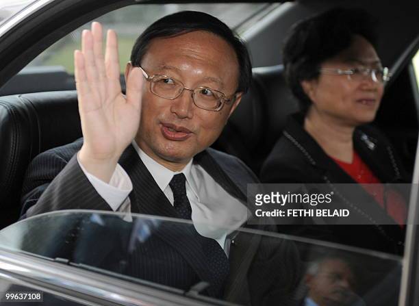 Chinese Foreign Minister Yang Jiechi waves to photographers in Tunisia on May 17, 2010. Jiechi arrived in Tunisia at the start of a two-day official...