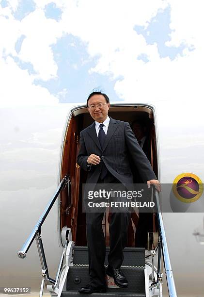Chinese Foreign Minister Yang Jiechi disembarks on his arrival in Tunis on May 17, 2010. Jiechi arrived in Tunisia for a two-day official visit on...
